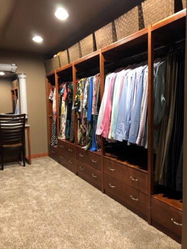 Customer photo of a Lundia closet in our Cherry finish